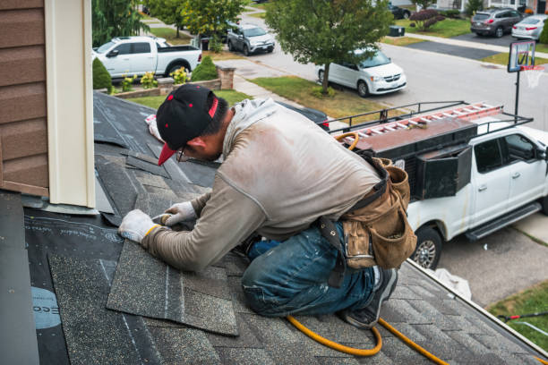 Professional Roofing technician working in Guilford, NY